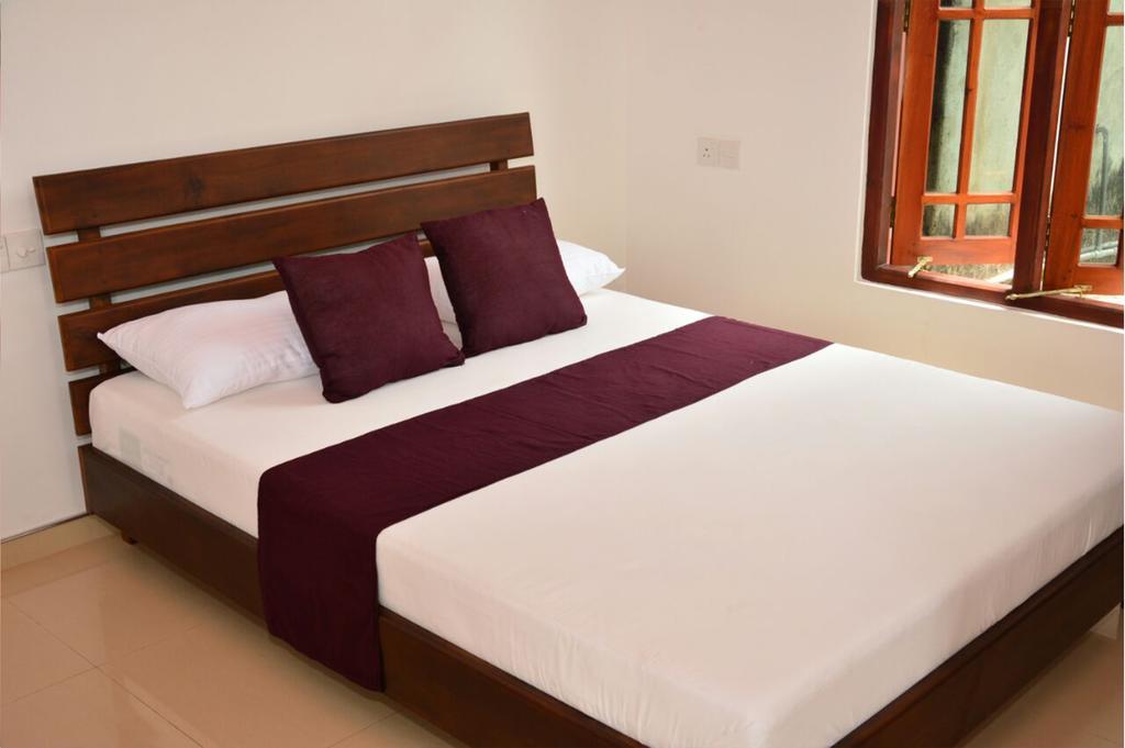 Hotel Tropical Garden à Negombo Extérieur photo